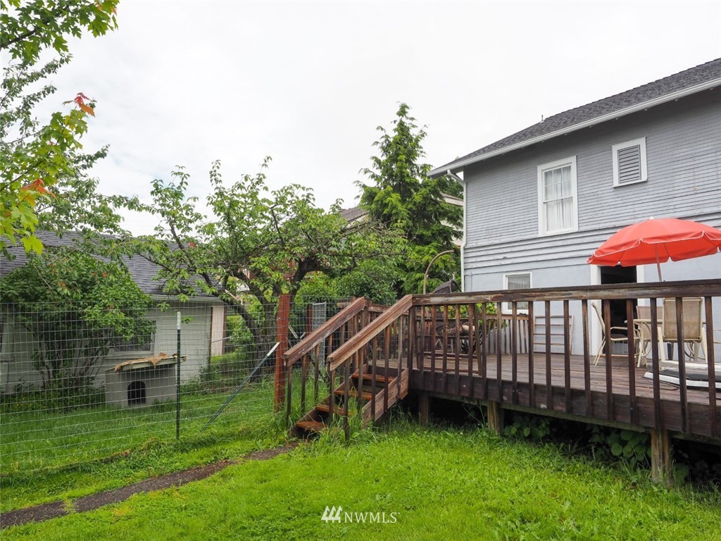 245 Southeast Washington Avenue Chehalis, WA 98532 - Photo 7 of 21 a view of a chair and table in the backyard