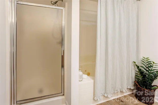 a bathroom with a shower curtain