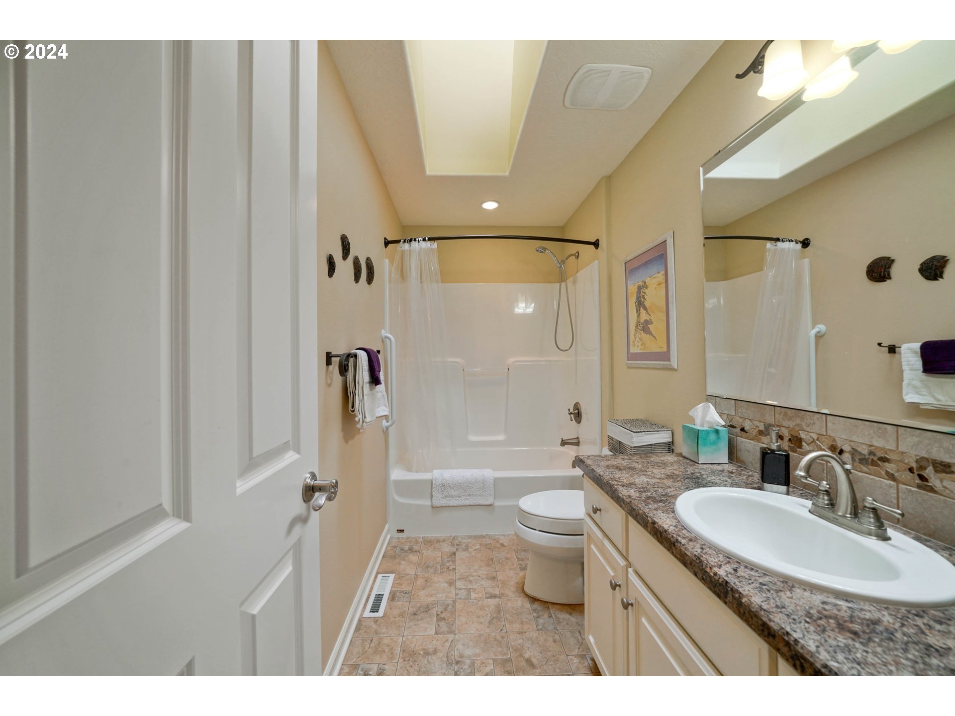 2155 Southeast Rhododendron Avenue Dallas, OR 97338 - Photo 36 of 40 a bathroom with a granite countertop sink toilet a shower and a mirror