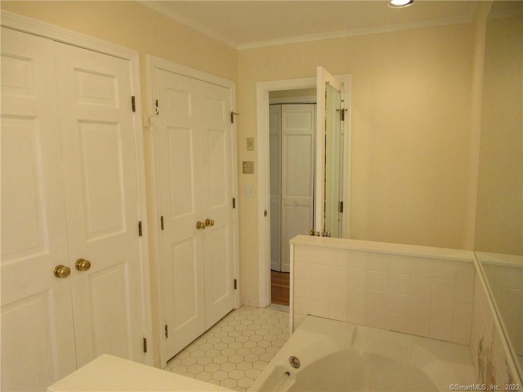 11 Burnt Swamp Road Woodbridge, CT 06525 - Photo 19 of 29 a bathroom with a shower and a toilet