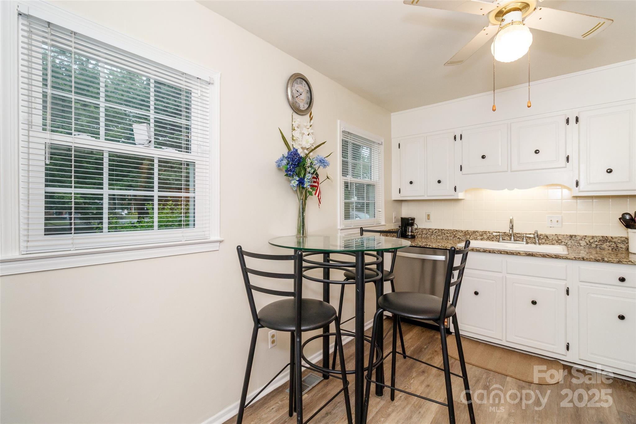 8300 Knights Bridge Road Charlotte, NC 28210 - Photo 13 of 47 a view of a dining room with furniture and a window