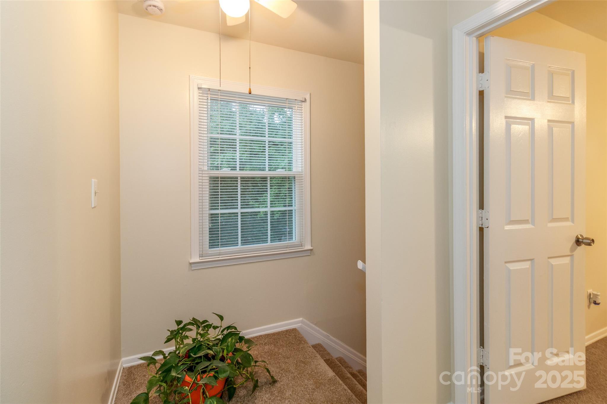 8300 Knights Bridge Road Charlotte, NC 28210 - Photo 20 of 47 a bathroom with a window