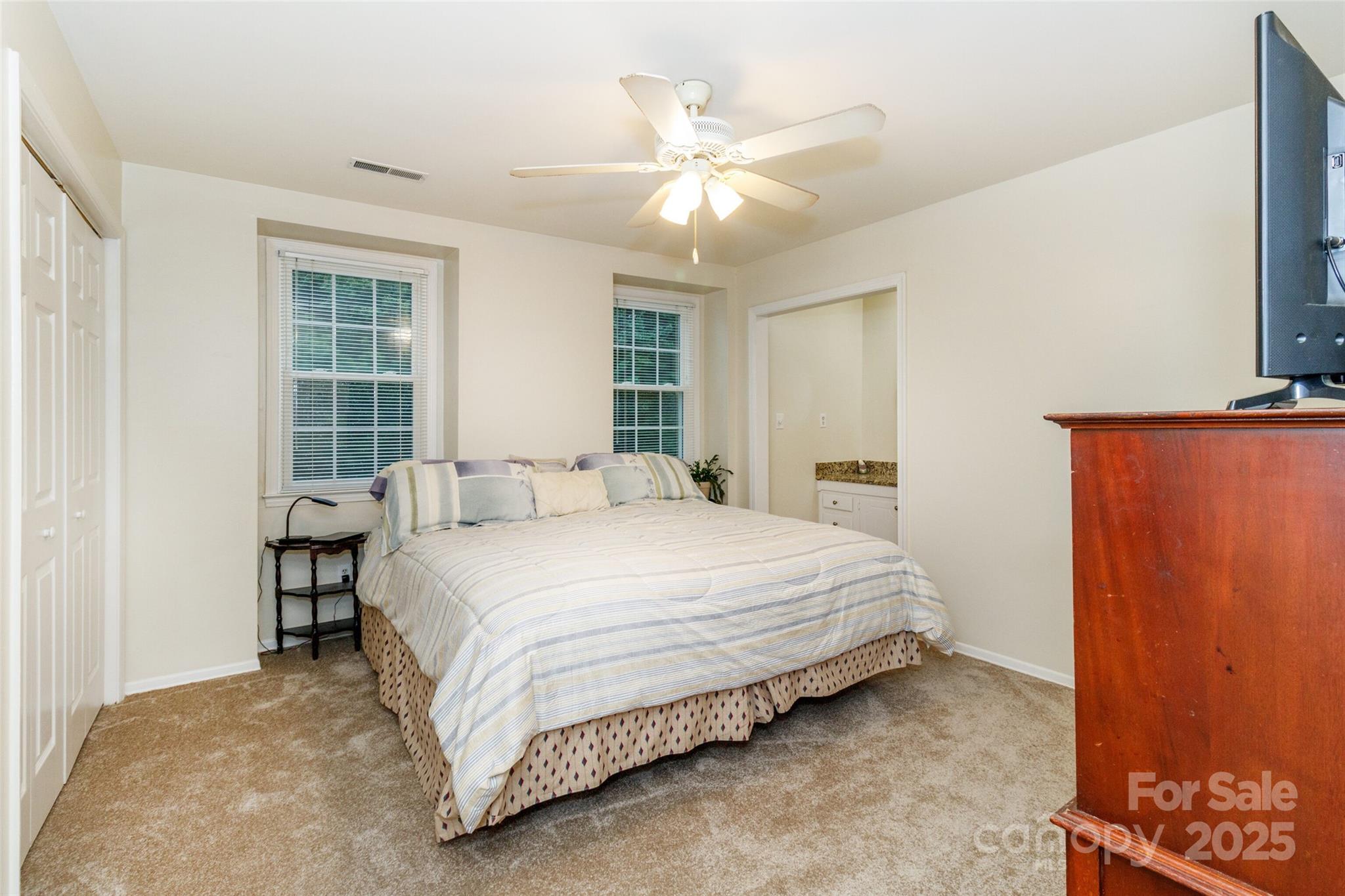 8300 Knights Bridge Road Charlotte, NC 28210 - Photo 28 of 47 a bedroom with a bed and a window