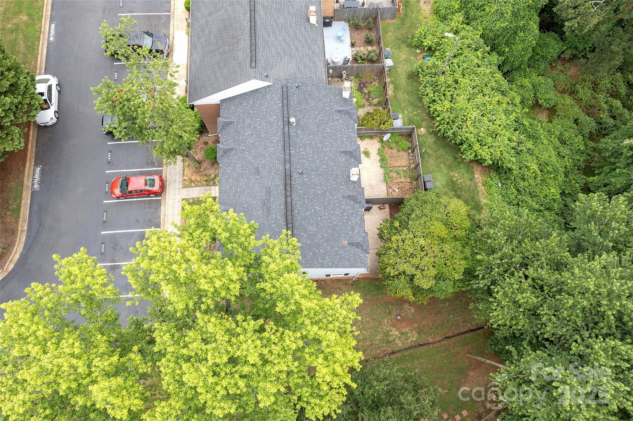 8300 Knights Bridge Road Charlotte, NC 28210 - Photo 37 of 47 an aerial view of a house with a yard and garden