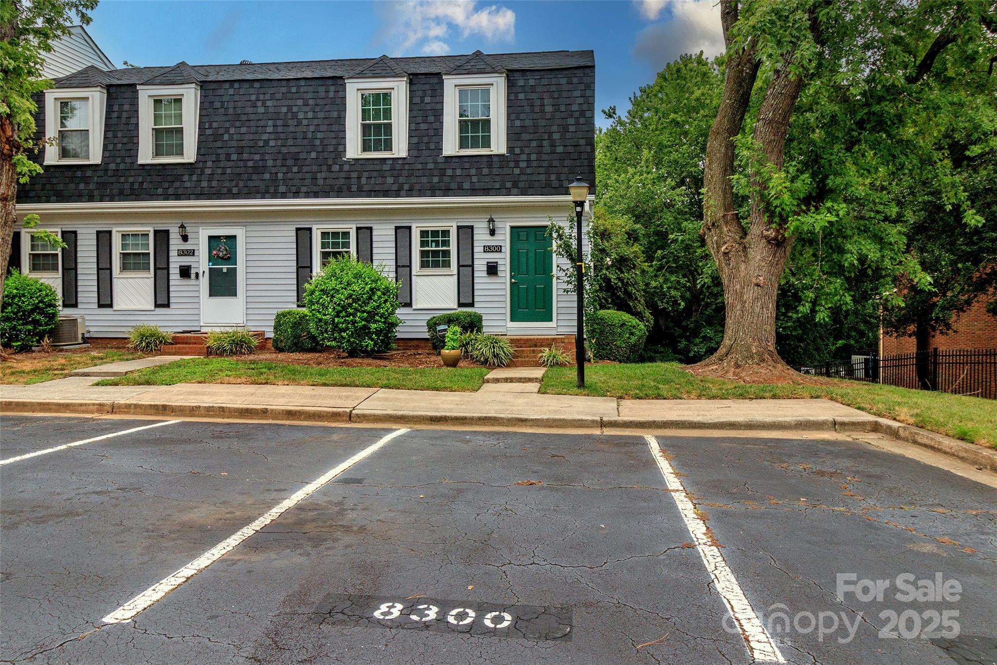 8300 Knights Bridge Road Charlotte, NC 28210 - Photo 4 of 47 a view of a house with a yard