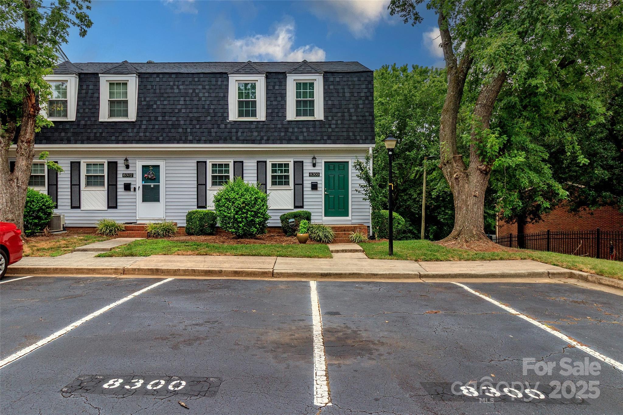 8300 Knights Bridge Road Charlotte, NC 28210 - Photo 46 of 47 a front view of a house with a yard