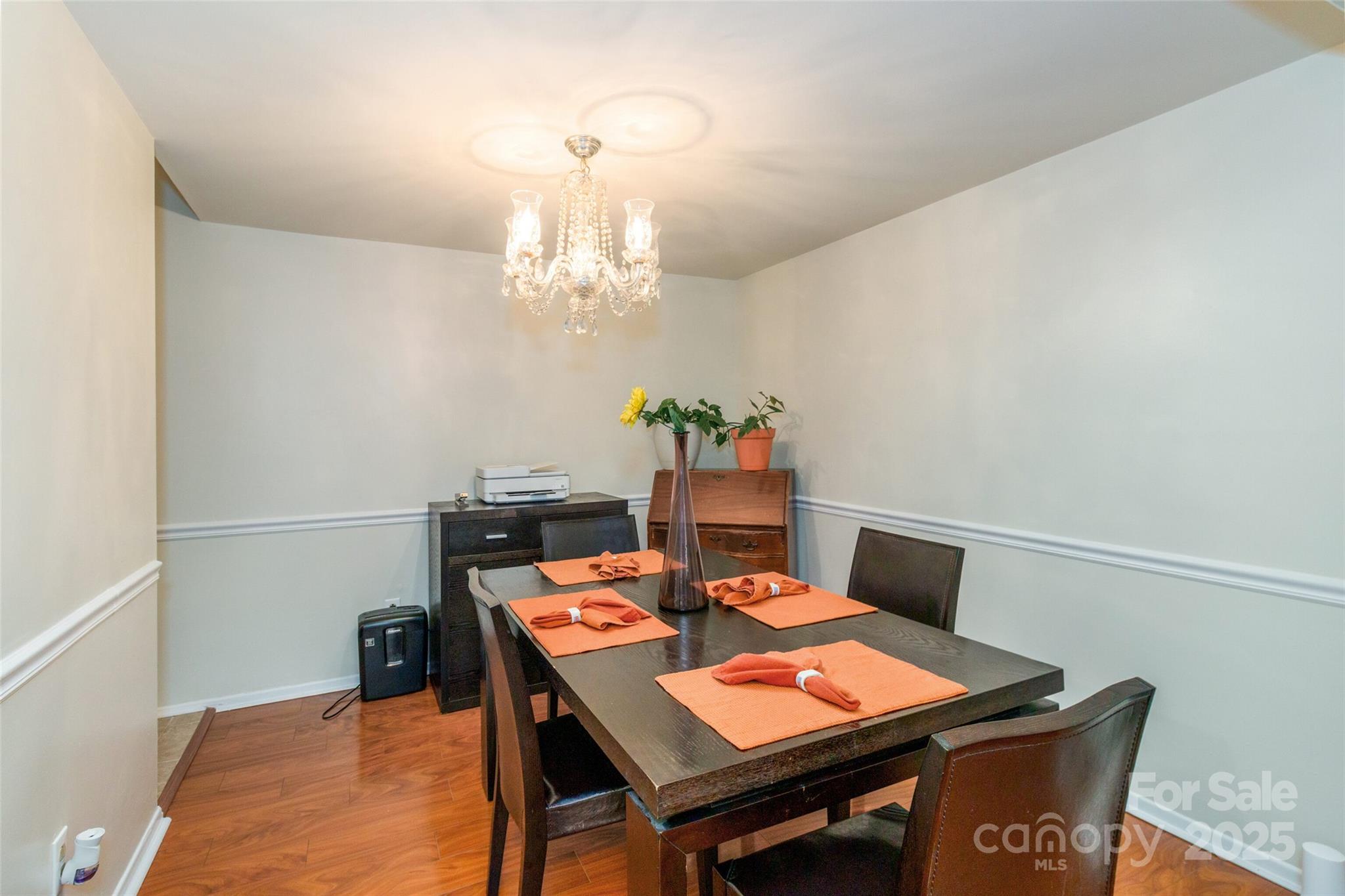 8300 Knights Bridge Road Charlotte, NC 28210 - Photo 6 of 47 a view of a dining room with a table and chairs