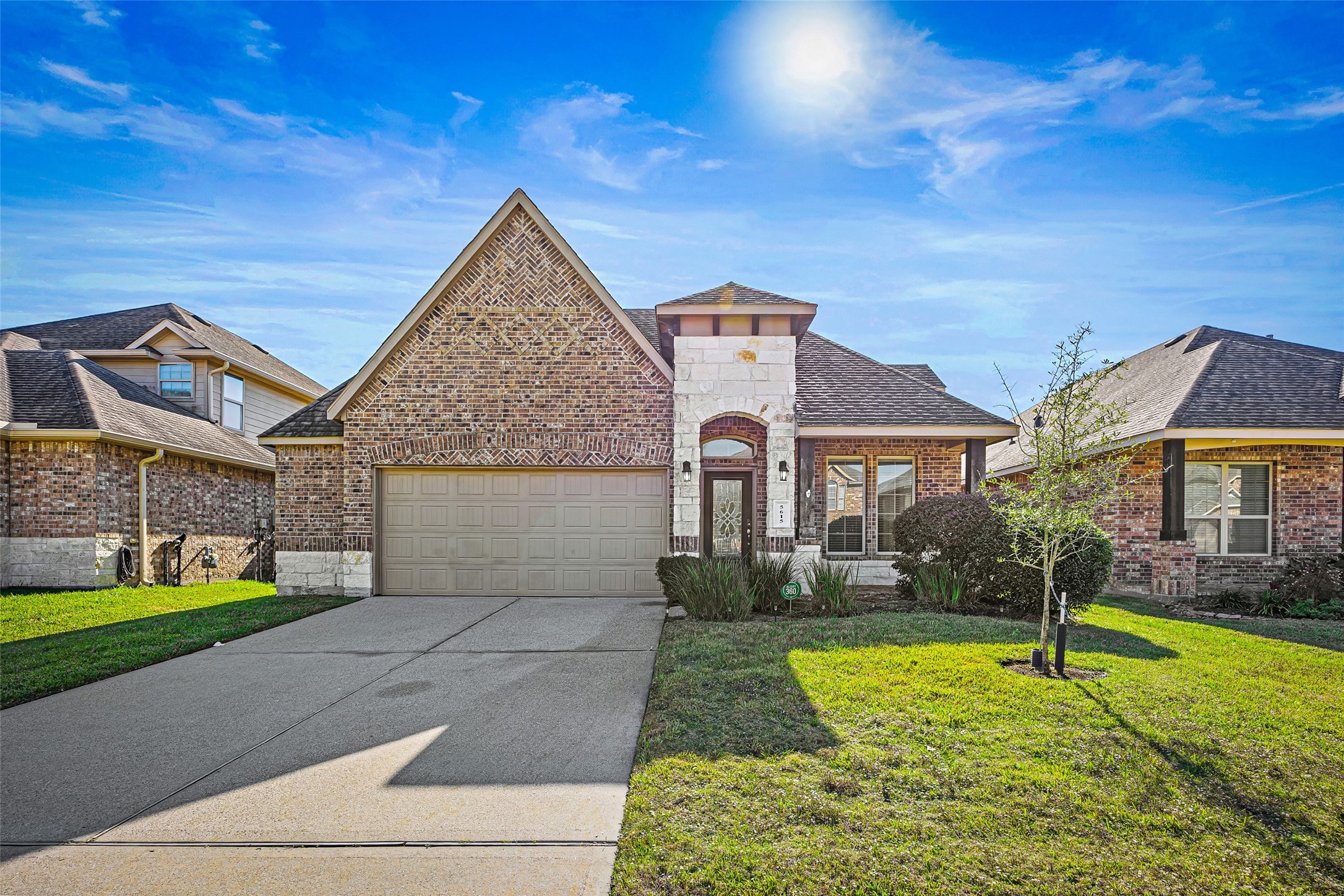 5615 Glenfield Spring Lane Spring, TX 77389 - Photo 1 of 28 a front view of a house with garden