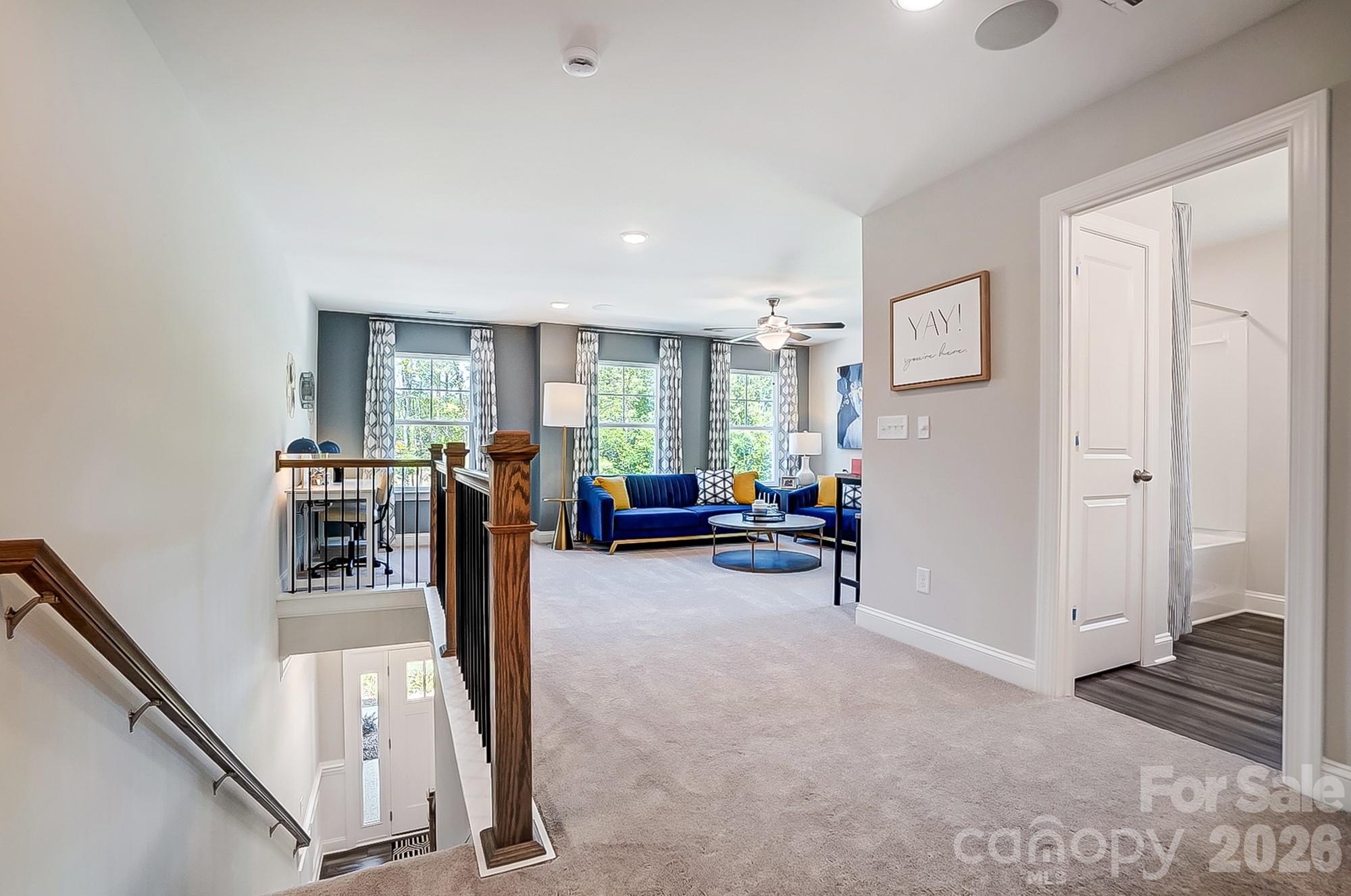 8615 Frank Grier Road Charlotte, NC 28215 - Photo 23 of 47 a view of a livingroom with furniture and windows