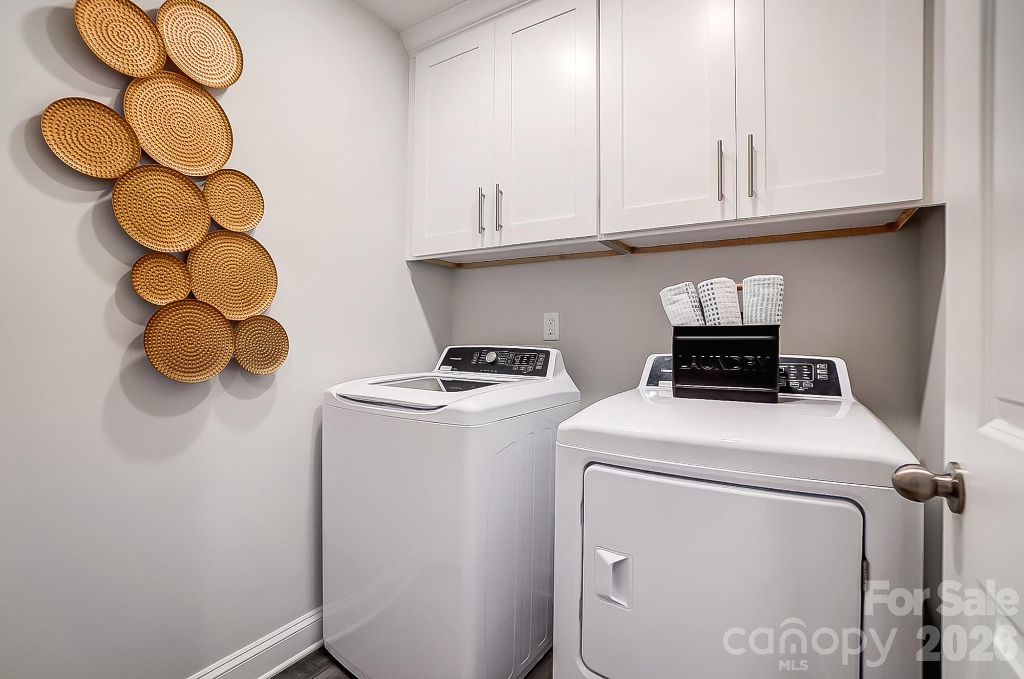 8615 Frank Grier Road Charlotte, NC 28215 - Photo 42 of 47 a utility room with dryer and washer
