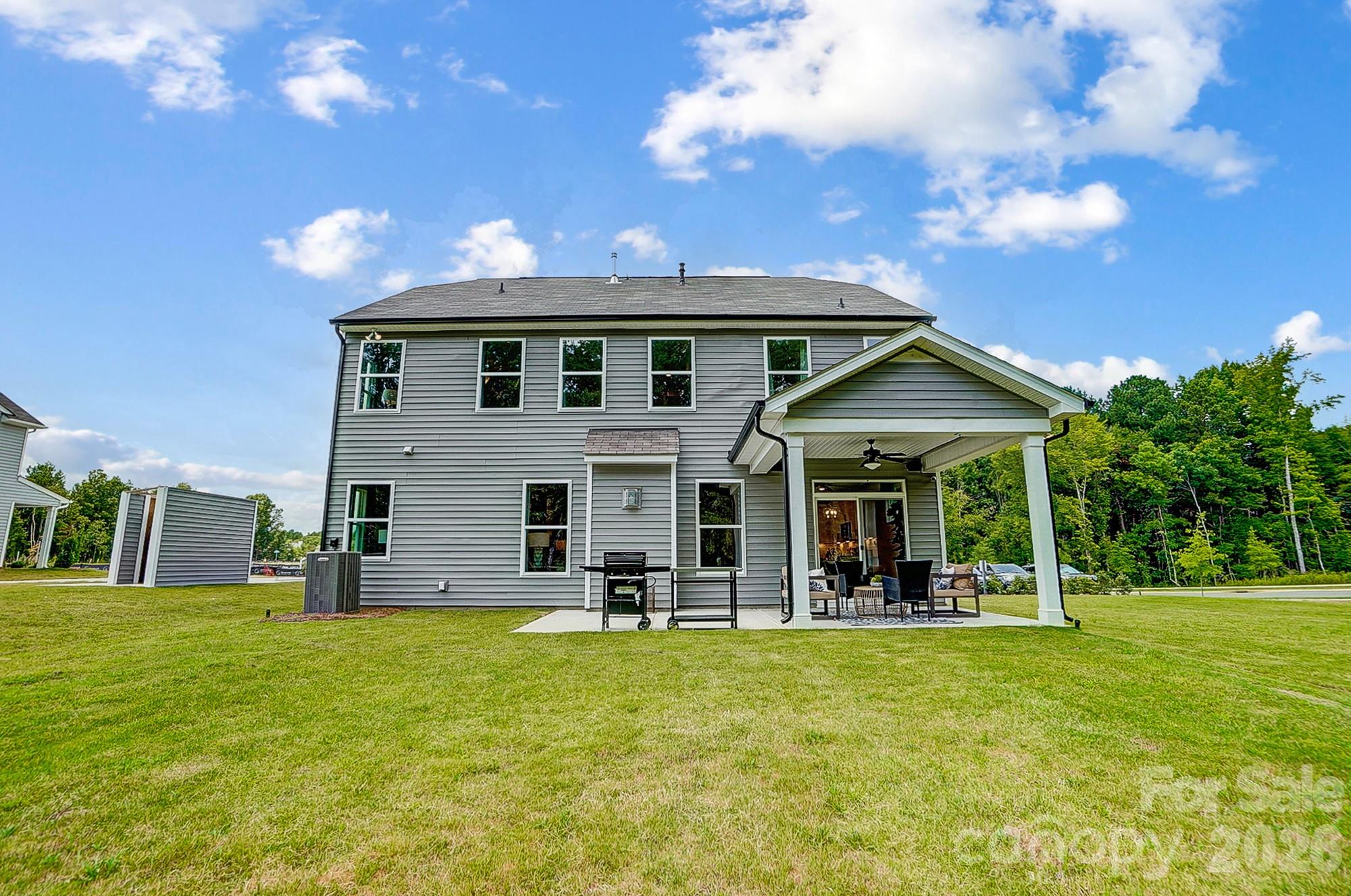 8615 Frank Grier Road Charlotte, NC 28215 - Photo 45 of 47 a view of a house with a swimming pool