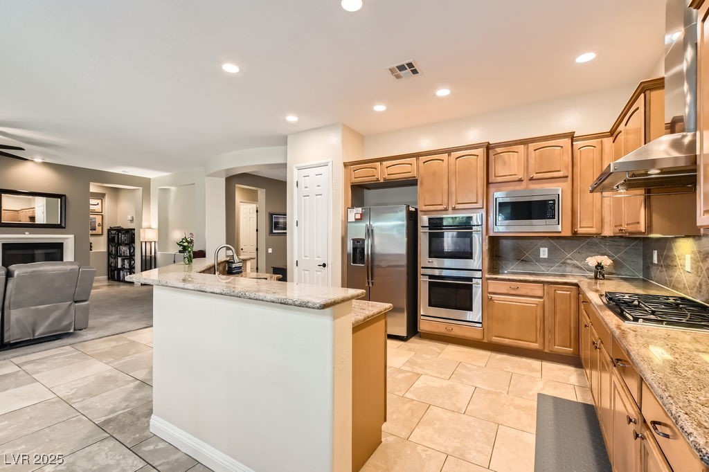 7513 Java Sparrow Street North Las Vegas, NV 89084 - Photo 11 of 36 Kitchen featuring stainless steel appliances, ope