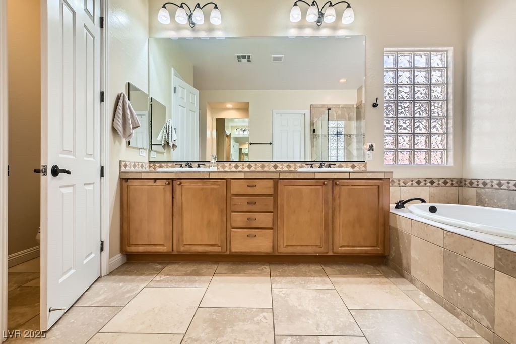 7513 Java Sparrow Street North Las Vegas, NV 89084 - Photo 18 of 36 Full bath featuring a healthy amount of sunlight,