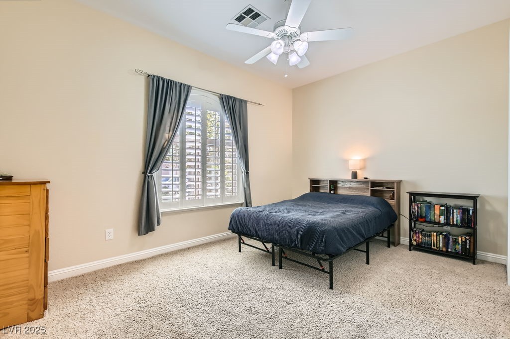 7513 Java Sparrow Street North Las Vegas, NV 89084 - Photo 19 of 36 Bedroom featuring ceiling fan with lights,carpet f