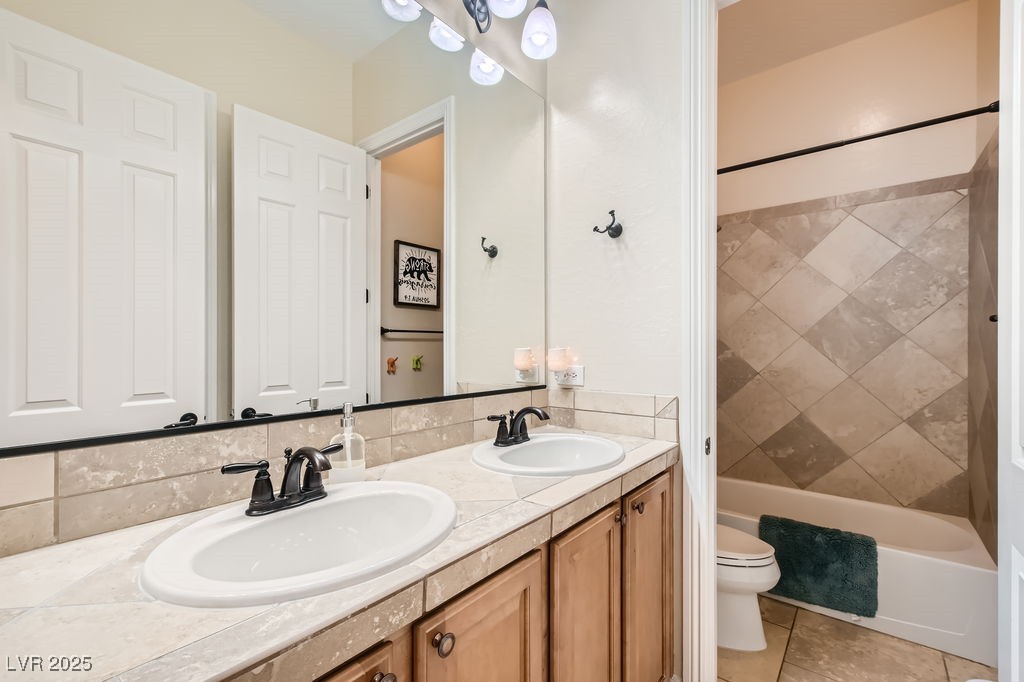 7513 Java Sparrow Street North Las Vegas, NV 89084 - Photo 20 of 36 Bathroom featuring tub / shower combination, doubl