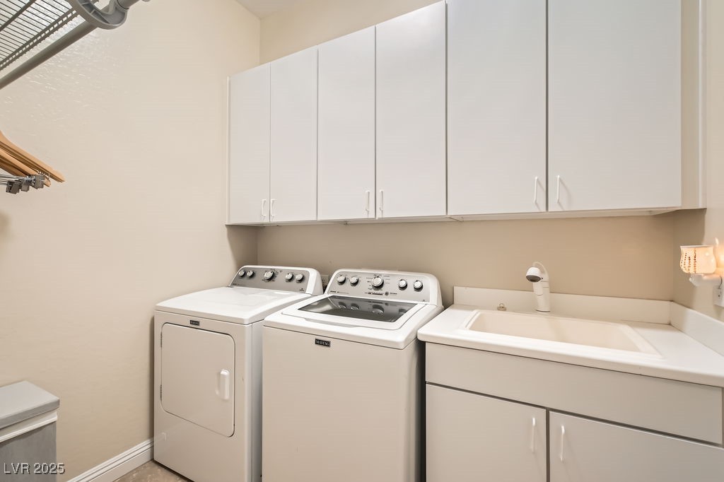 7513 Java Sparrow Street North Las Vegas, NV 89084 - Photo 22 of 36 Washroom with washing machine and clothes dryer, a
