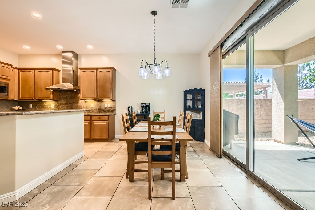 7513 Java Sparrow Street North Las Vegas, NV 89084 - Photo 9 of 36 Dining room with a chandelier, recessed lighting