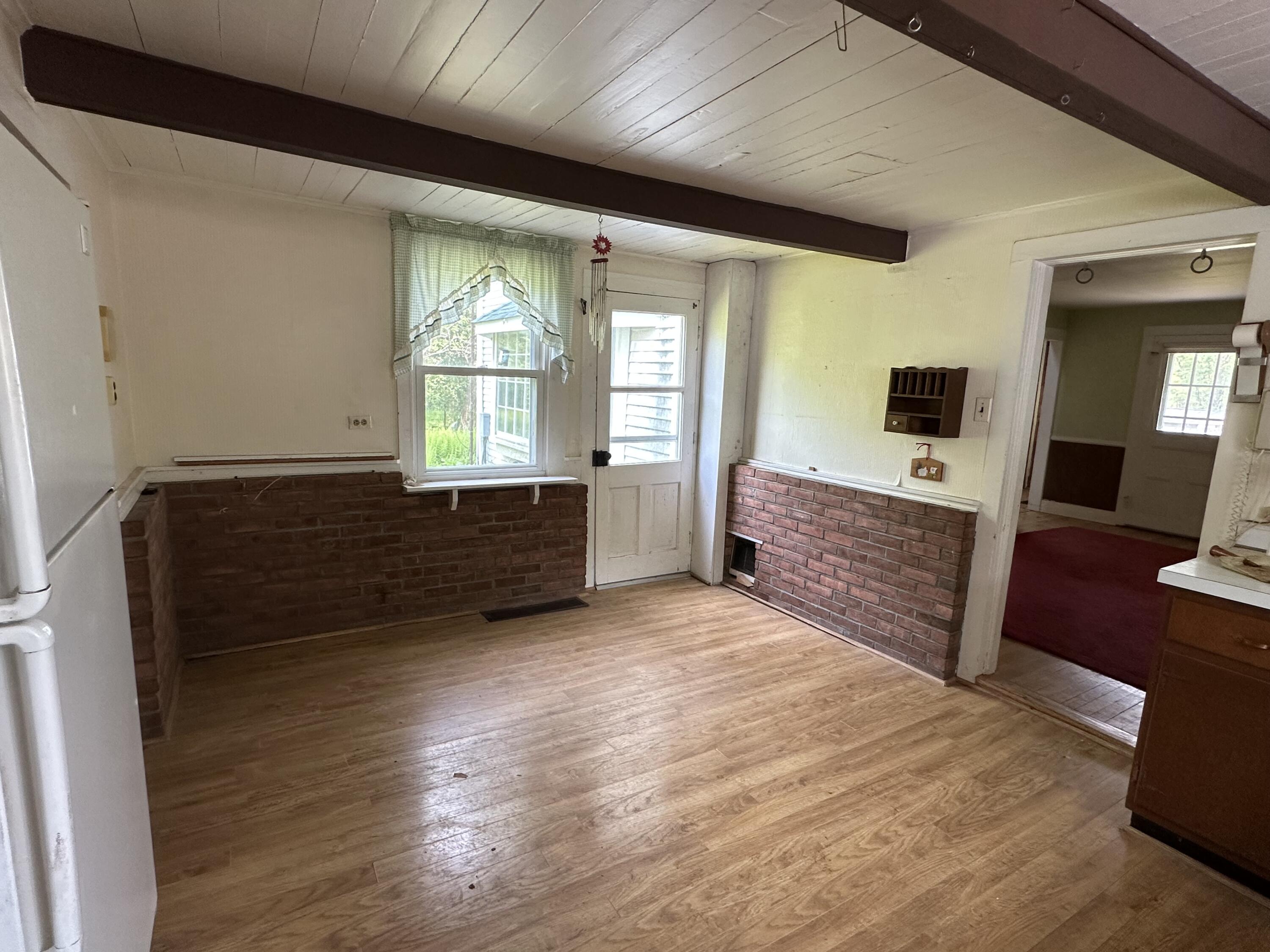 337 Summit Road Swiftwater, PA 18370 - Photo 25 of 35 a view of an empty room with wooden floor and a window