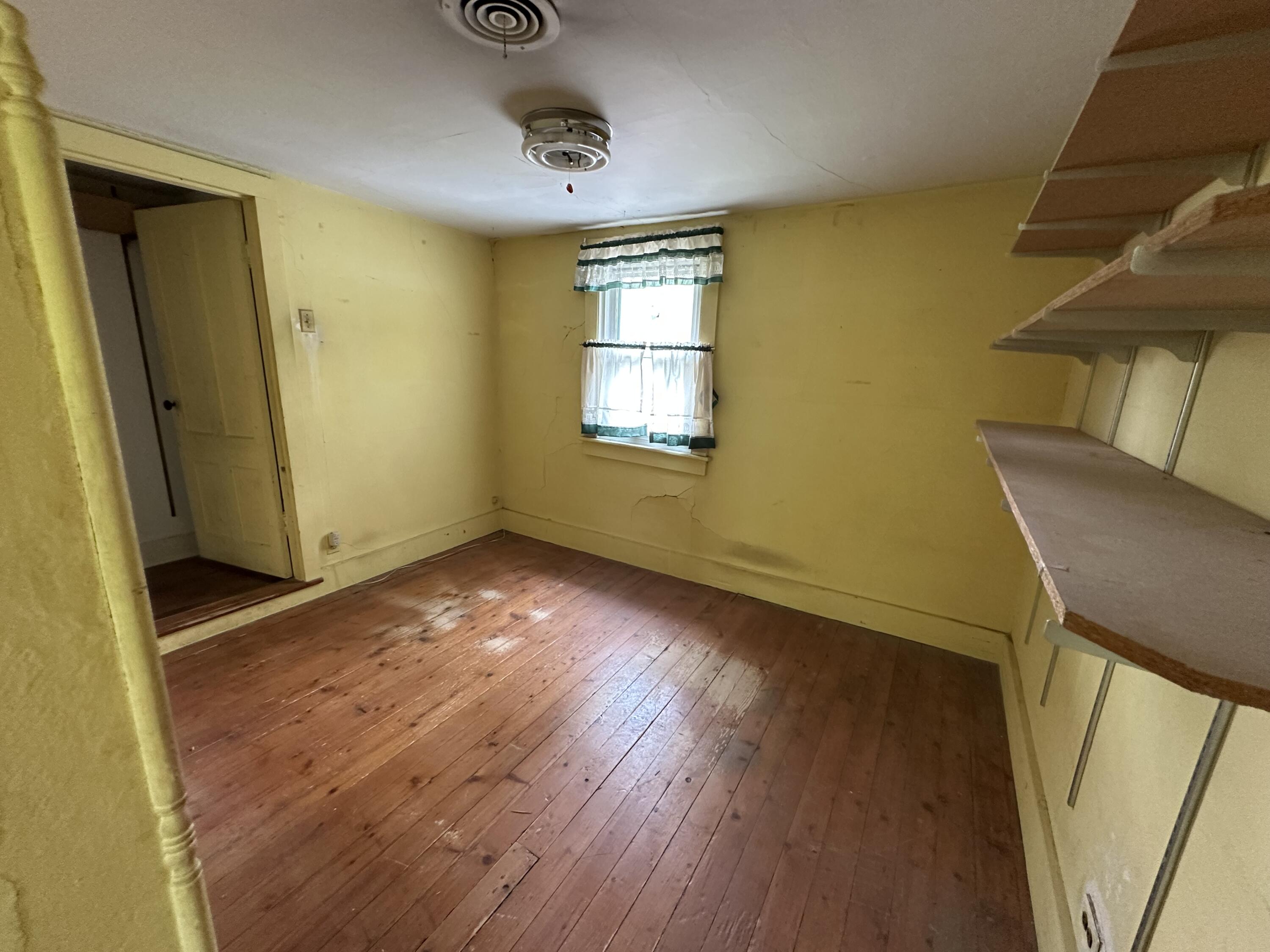 337 Summit Road Swiftwater, PA 18370 - Photo 27 of 35 a view of room with window and wooden floor