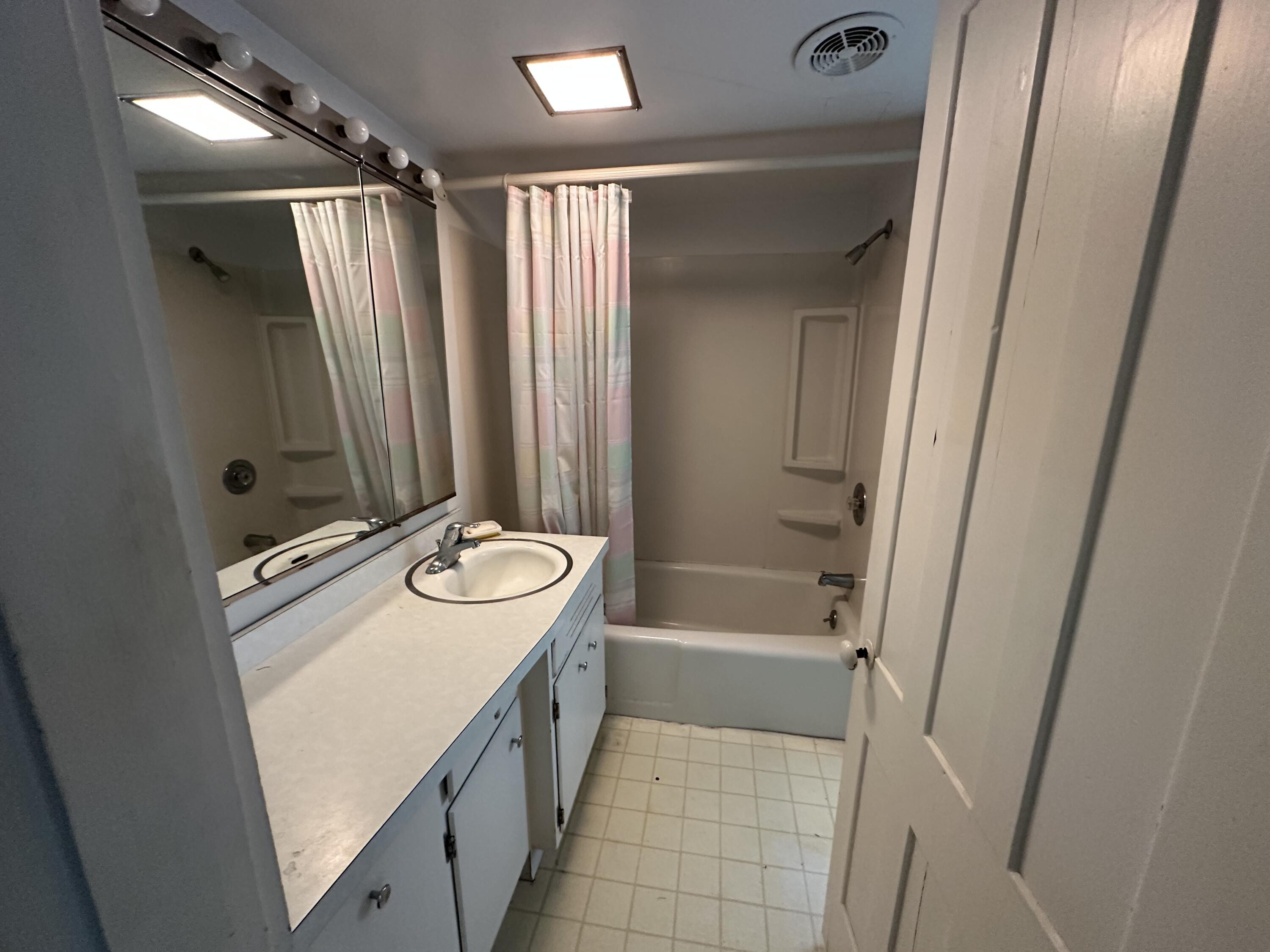 337 Summit Road Swiftwater, PA 18370 - Photo 28 of 35 a bathroom with a tub sink and mirror