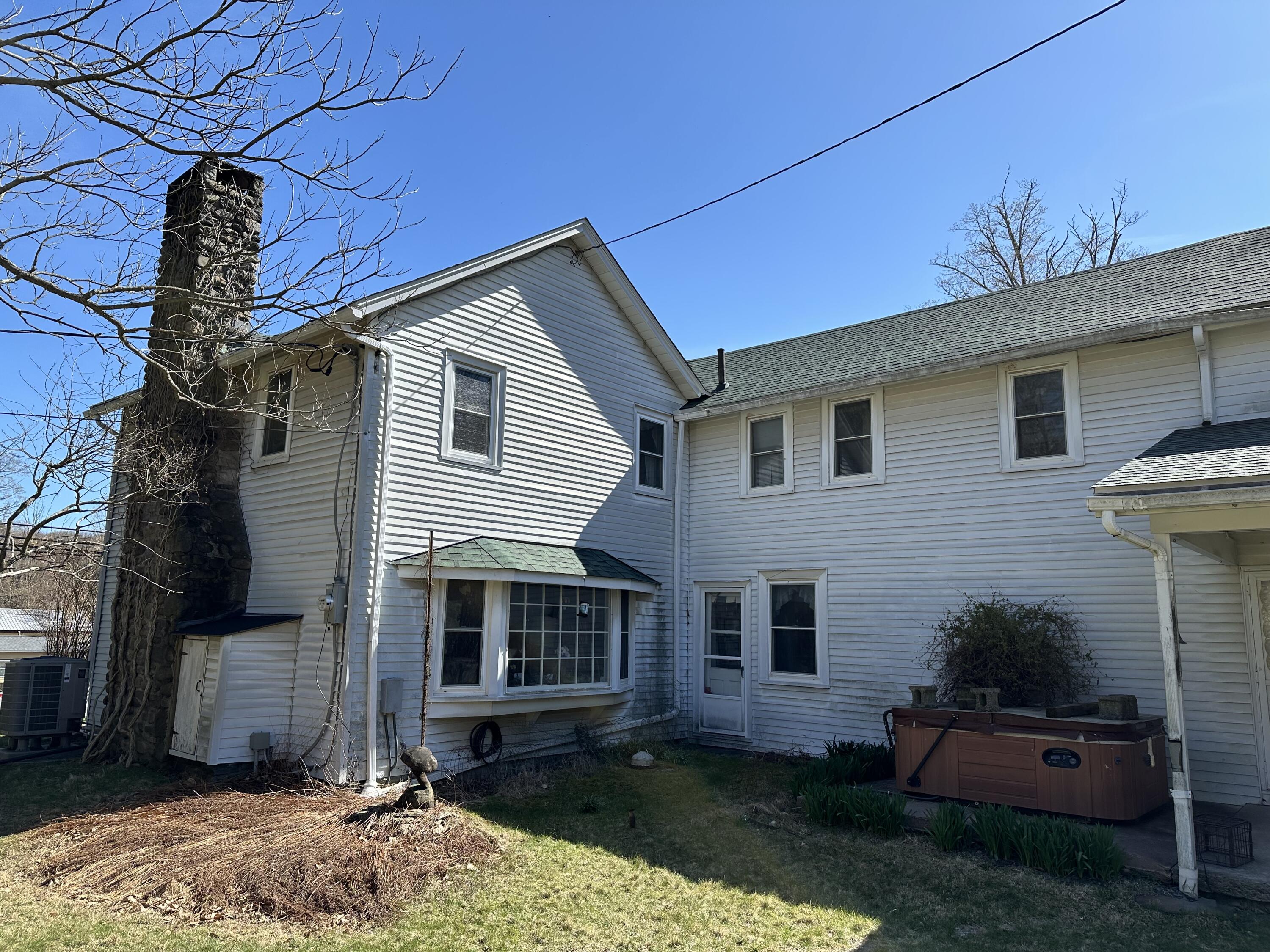 337 Summit Road Swiftwater, PA 18370 - Photo 5 of 35 a front view of a house with garden