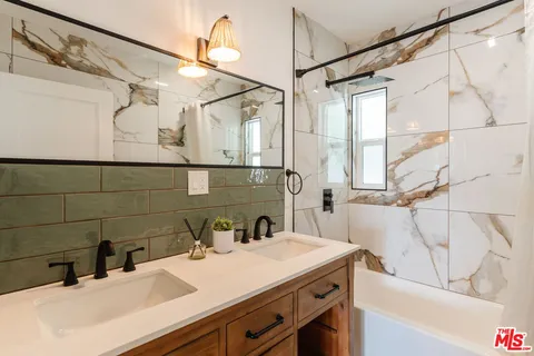 a workspace with furniture and a bookshelf