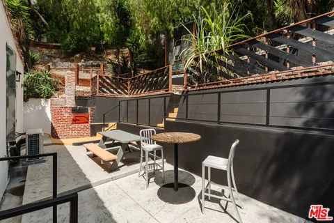 a view of a backyard of the house