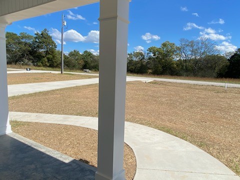 128 Pisgah Ridge Road Pulaski, TN 38478 - Photo 3 of 18 a view of an outdoor space and basketball court