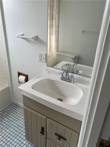 a bathroom with a sink and a toilet