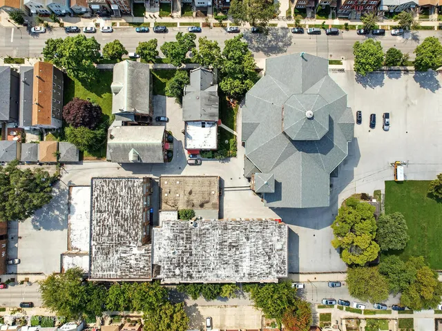 an aerial view of a house with a garden