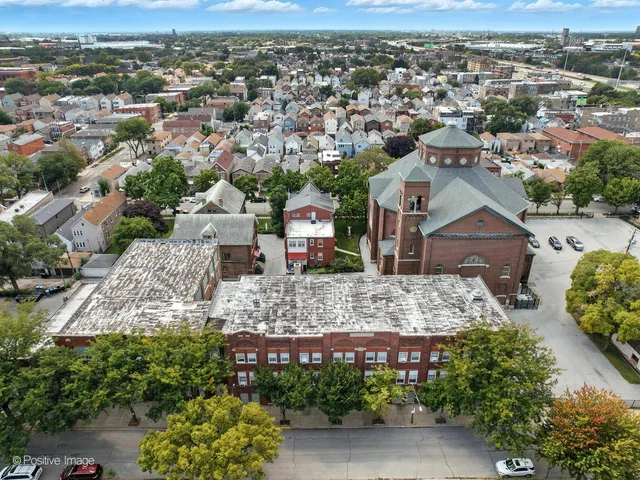 an aerial view of a city with lots of residential buildings