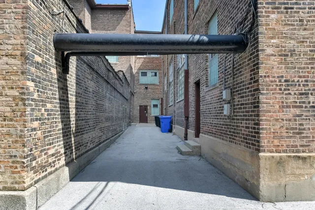 an aerial view of a house with a garden