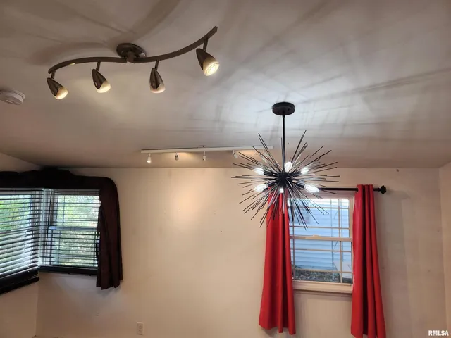 a lamp on a table in a kitchen