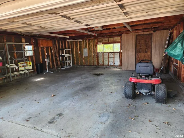 a view of a room with wooden walls
