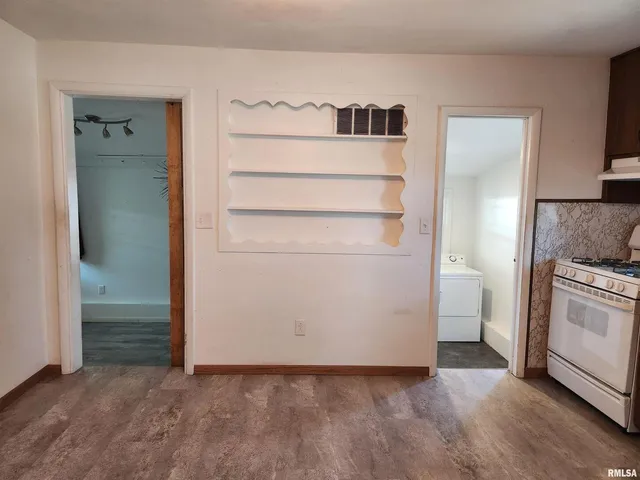 a view of storage and utility room with washer and dryer