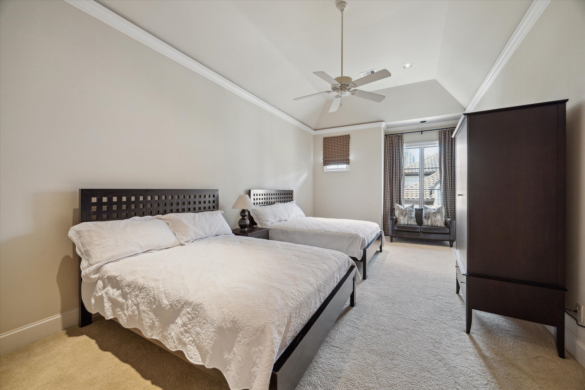 1110 Longmont Pl Court Houston, TX 77056 - Photo 26 of 35 a bedroom with bed and a chandelier