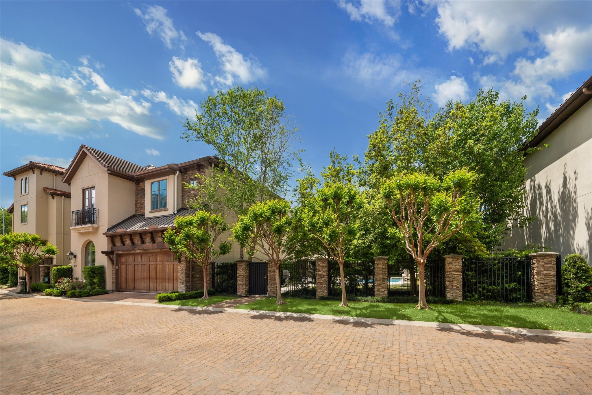 1110 Longmont Pl Court Houston, TX 77056 - Photo 4 of 35 a front view of a house with a yard