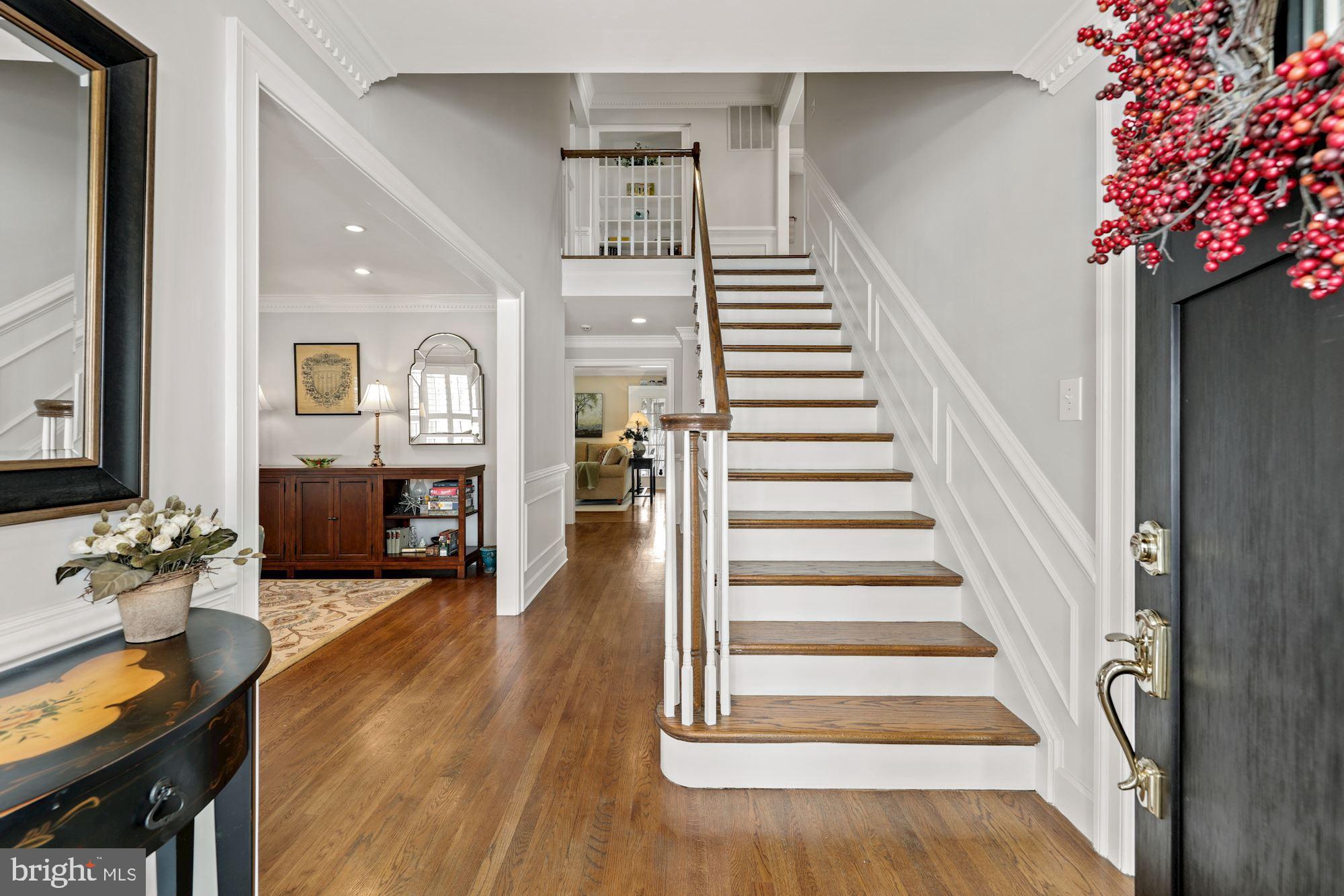 203 Tschiffely Square Road Gaithersburg, MD 20878 - Photo 3 of 38 Hardwood foyer w/HW & gorgeous moldings
