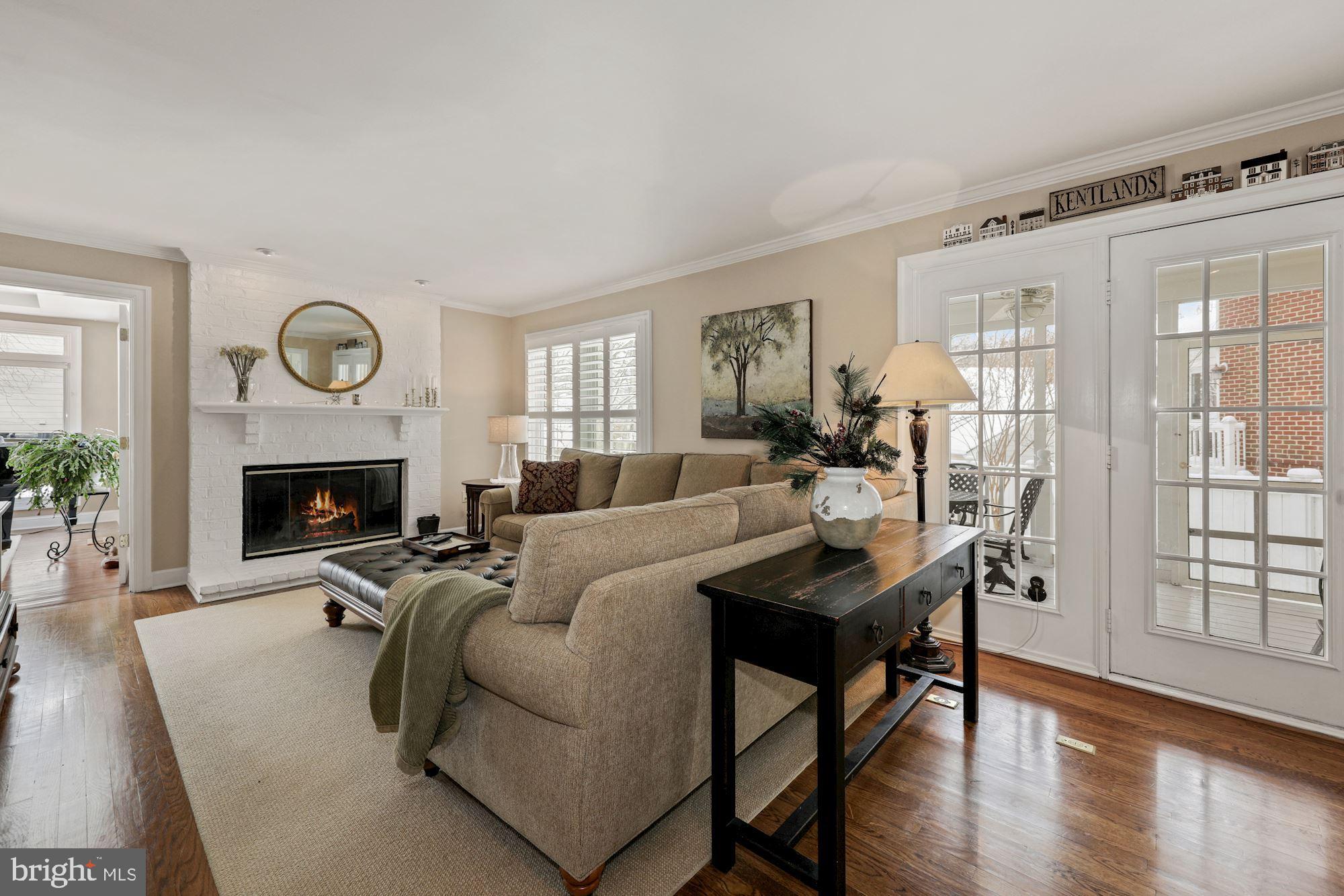 203 Tschiffely Square Road Gaithersburg, MD 20878 - Photo 9 of 38 Family room w/cozy wood burning fireplace