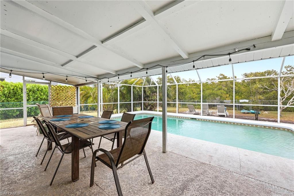 2347 Harbor Road Naples, FL 34104 - Photo 23 of 29 a dining room with furniture window and outside view