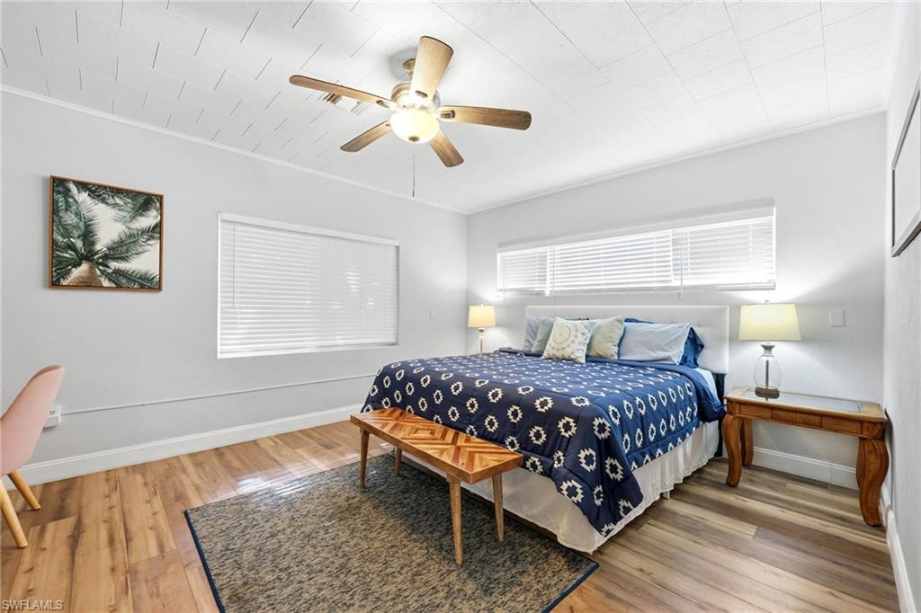 2347 Harbor Road Naples, FL 34104 - Photo 10 of 29 a bedroom with a bed and window