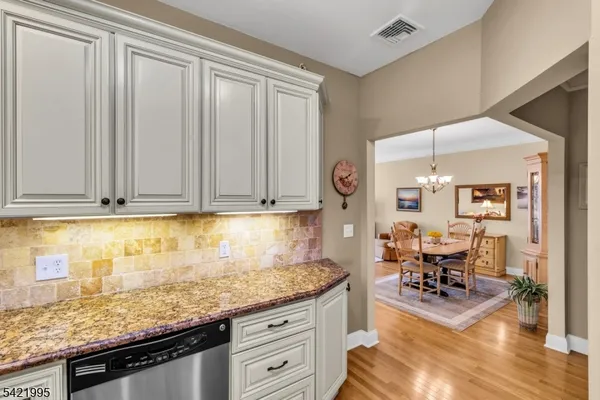 a kitchen with granite countertop lots of counter top space