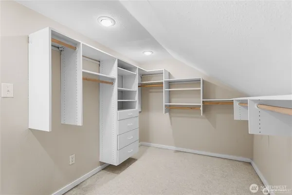 a view of an empty walk in closet