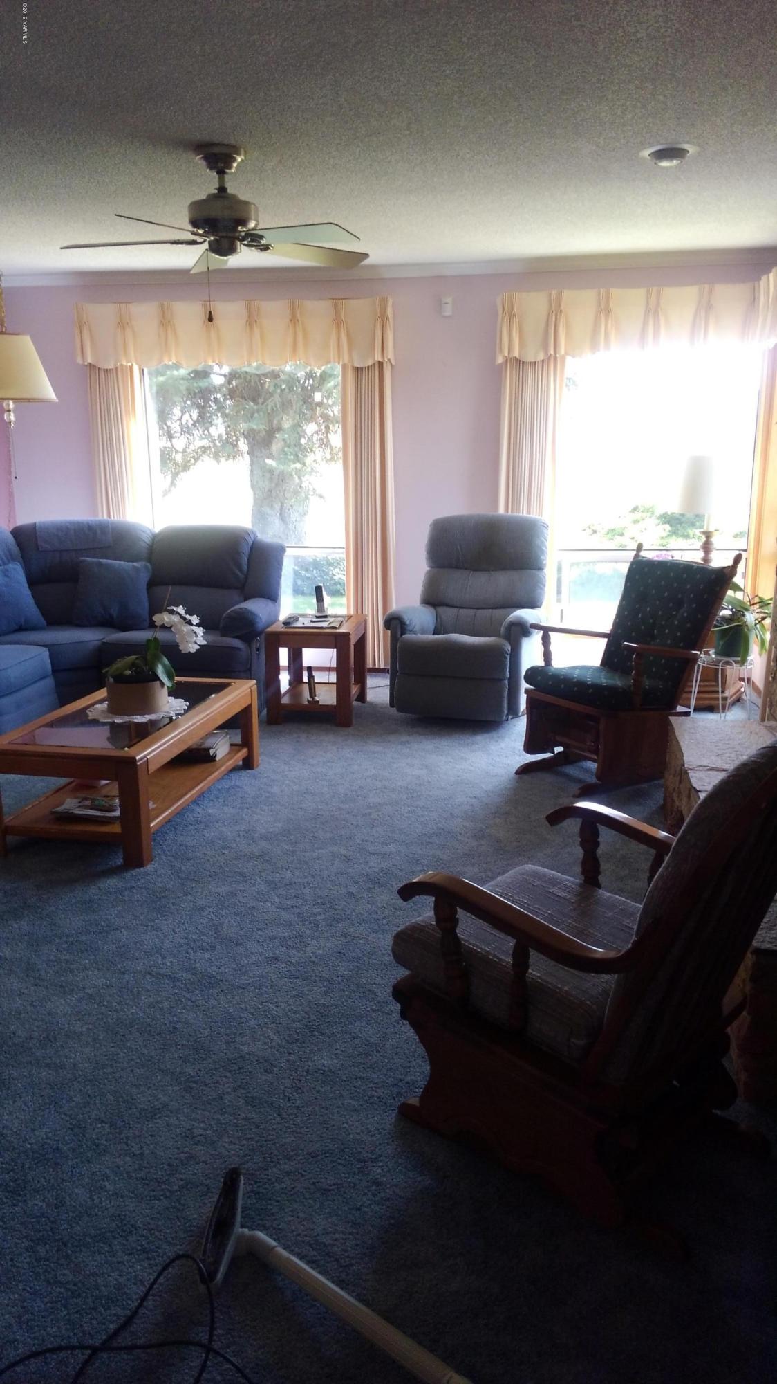10043 Fort Road Wapato, WA 98951 - Photo 49 of 64 a room with furniture and a large window