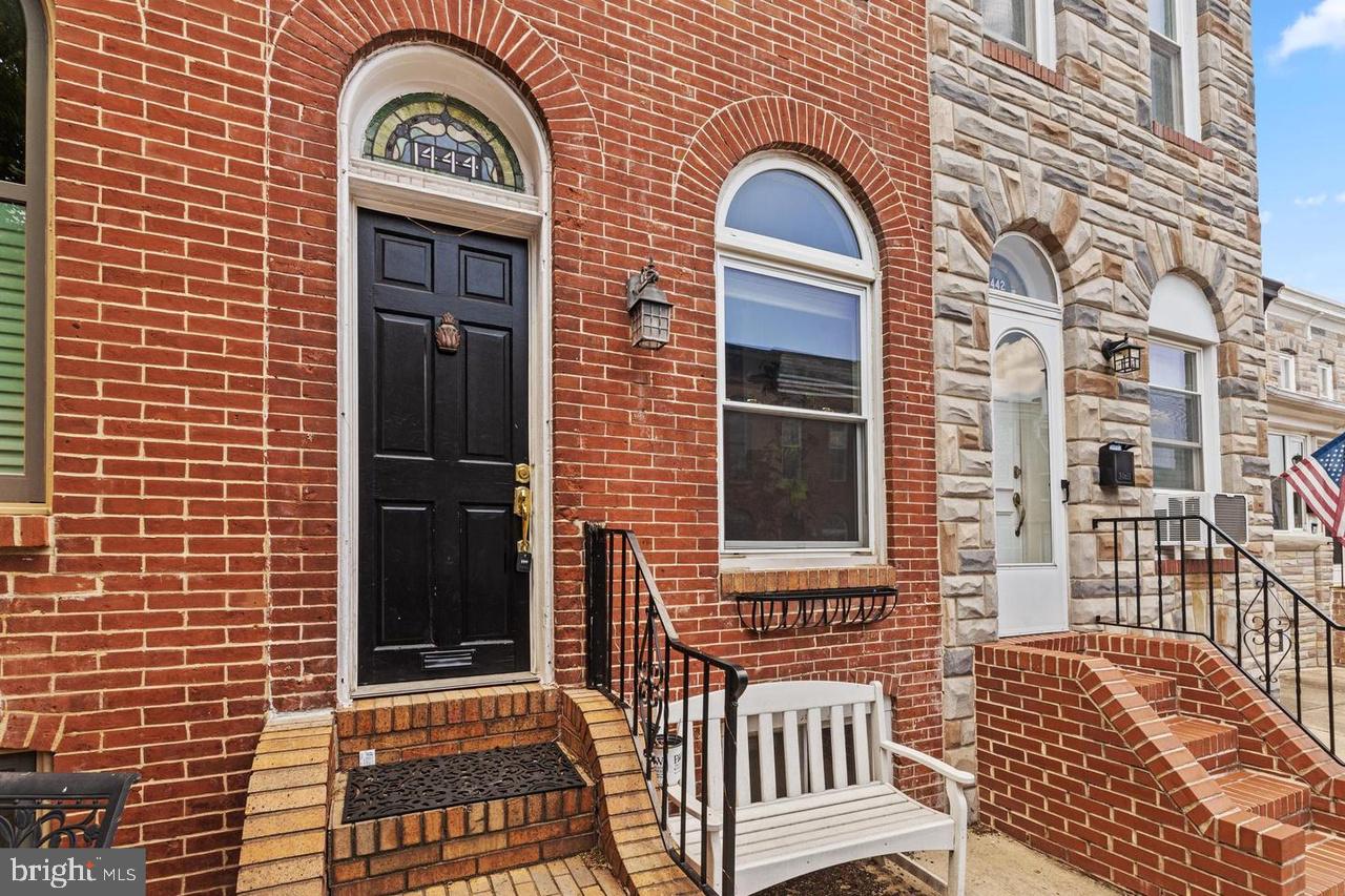 1444 Henry Street Baltimore, MD 21230 - Photo 1 of 18 Charming brick facade with inviting entry.