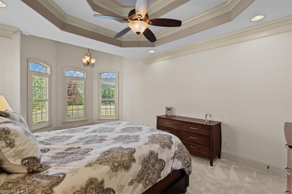 7787 Sutter Road Greensboro, NC 27455 - Photo 23 of 50 For an added benefit a sweet sitting room in the Primary suite to enjoy a good book and relax.