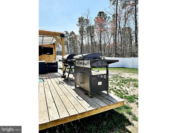 a view of a balcony with furniture