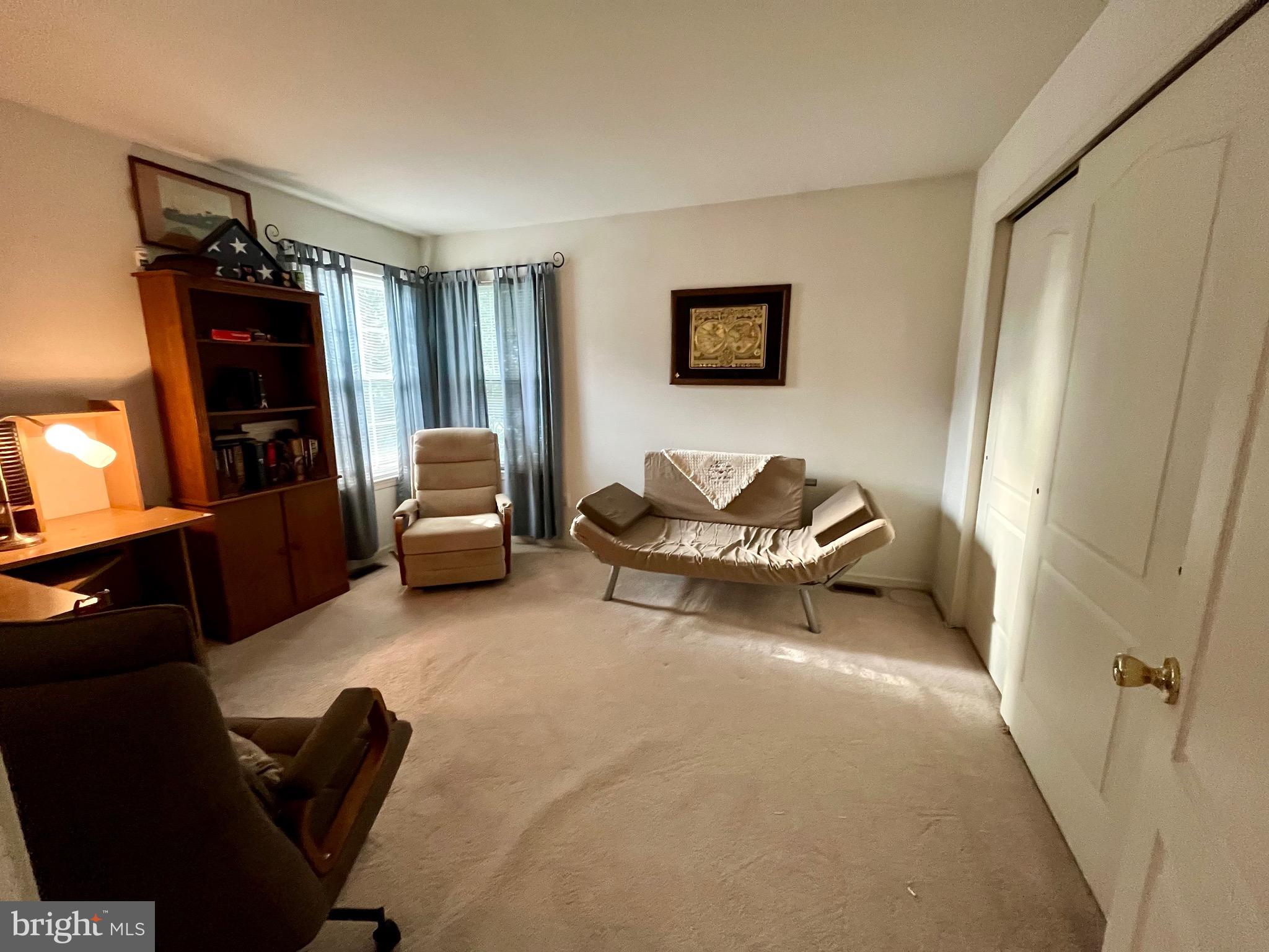 960 Butler Drive Williamstown, NJ 08094 - Photo 19 of 44 a living room with furniture and a window