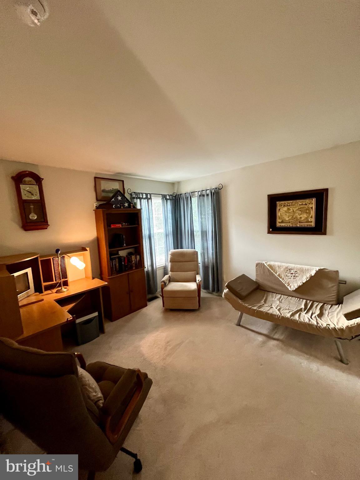 960 Butler Drive Williamstown, NJ 08094 - Photo 20 of 44 a bedroom with furniture and a lamp