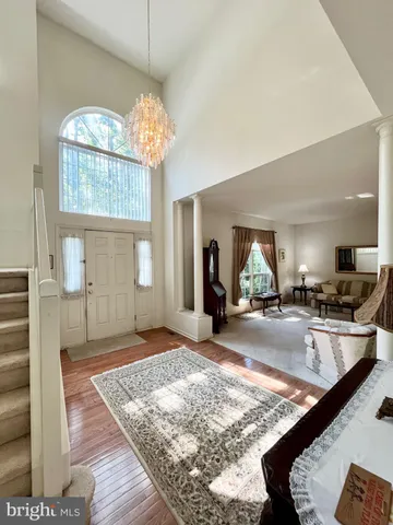 a view of a living room and kitchen